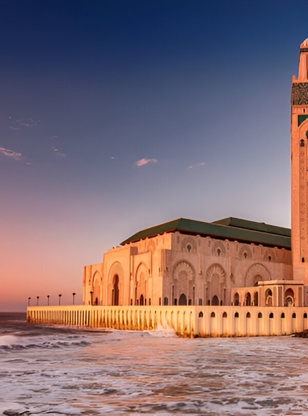 Hassan II Mosque in Casablanca at sunset overlooking the Atlantic Ocean