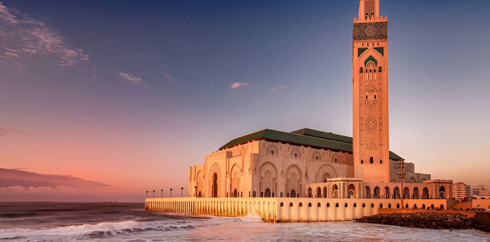 Hassan II Mosque in Casablanca at sunset overlooking the Atlantic Ocean