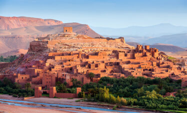 Panoramic view of Ait Benhaddou kasbah and traditional mud-brick village in southern Morocco.