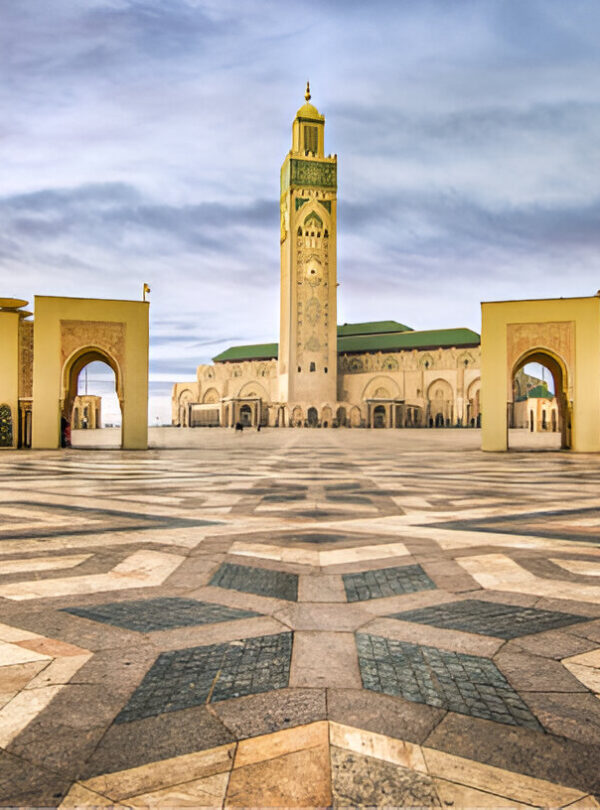 Exterior view of the Hassan II Mosque in Casablanca with its towering minaret and intricate architectural details