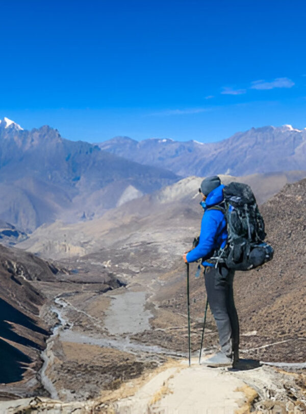 Trekking in Atlas Mountains Morocco with hikers exploring Berber villages and scenic landscapes